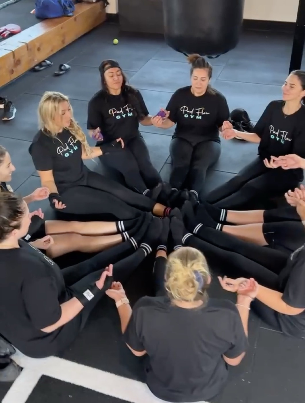 Pad Flow members sitting together after a group session