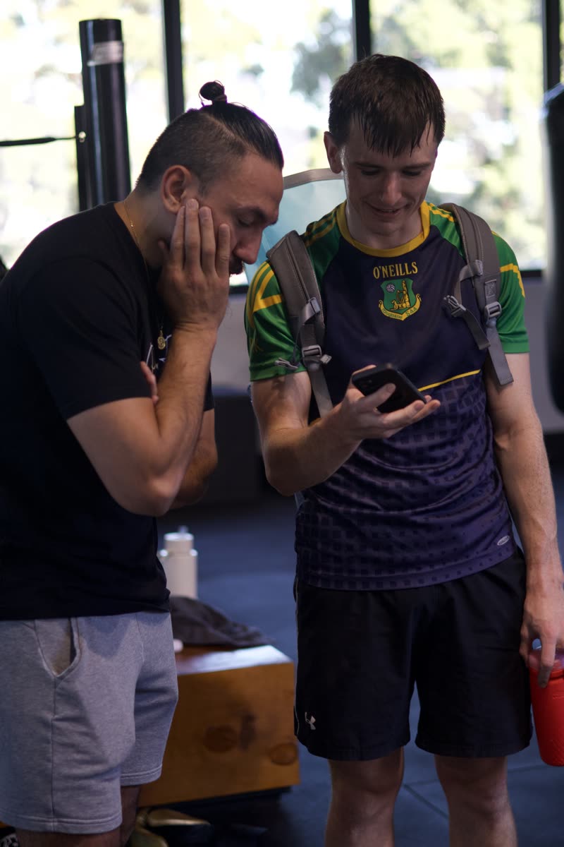 Coach and new member choosing a session time together